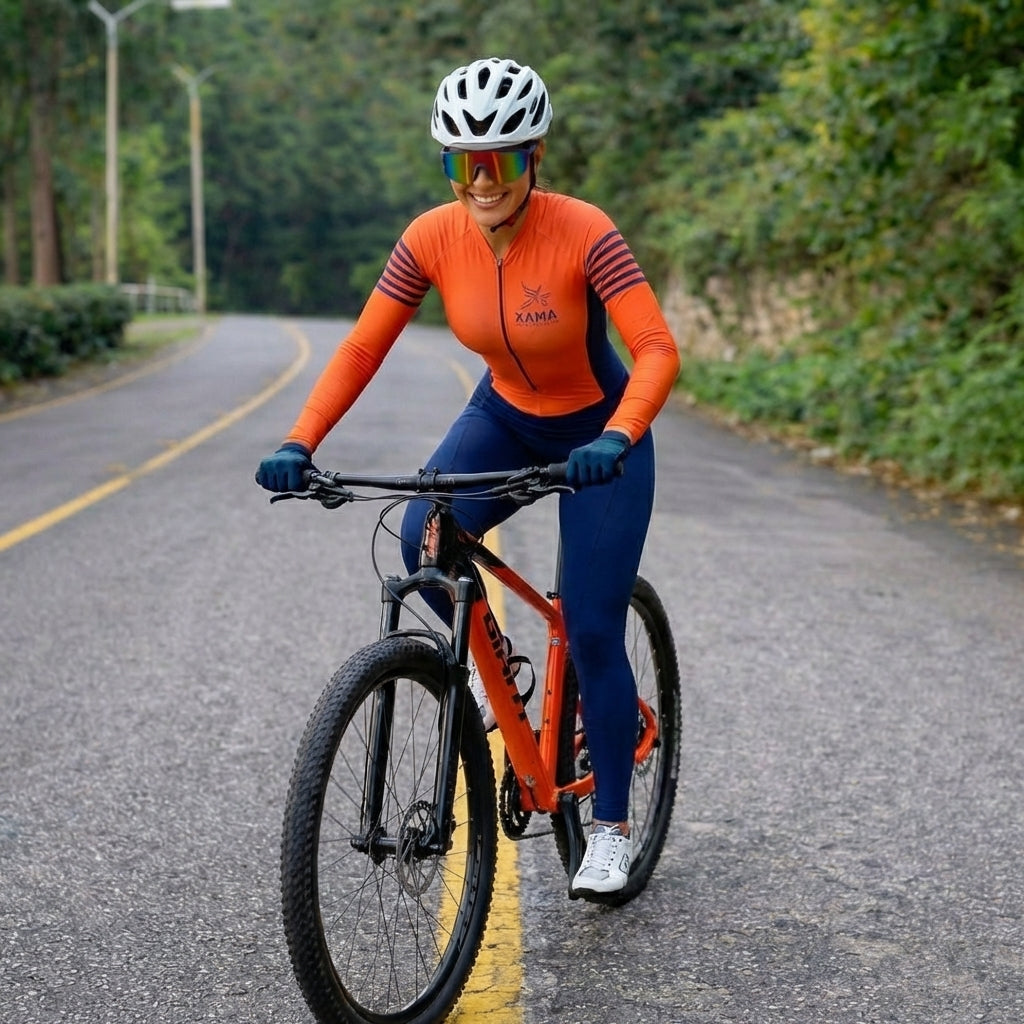 Macacão Ciclismo Feminino Xama Performance Vélor — Gel 20D, UV50+ e Alta Visibilidade Laranja