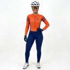 Macacão Ciclismo Feminino Xama Performance Vélor — Gel 20D, UV50+ e Alta Visibilidade Laranja